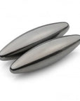 Two metallic oval objects on a white background