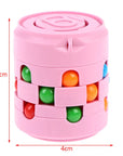 Pink cylindrical puzzle toy with colorful beads and measurements on a white background