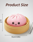 Plain pink squishy dumpling product size chart showing 5cm height and 10cm x 10cm width and depth in bamboo steamer