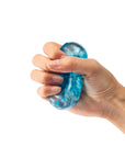 Hand holding a blue stress ball against a white background