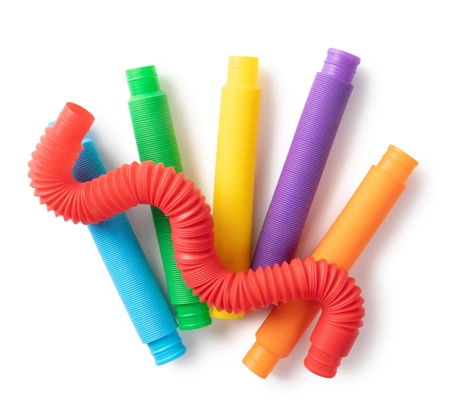 Colorful coiled tubes on a white background