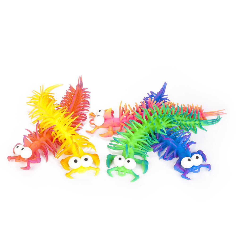 Colorful toy sea creatures on a white background