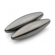 Two metallic oval objects on a white background