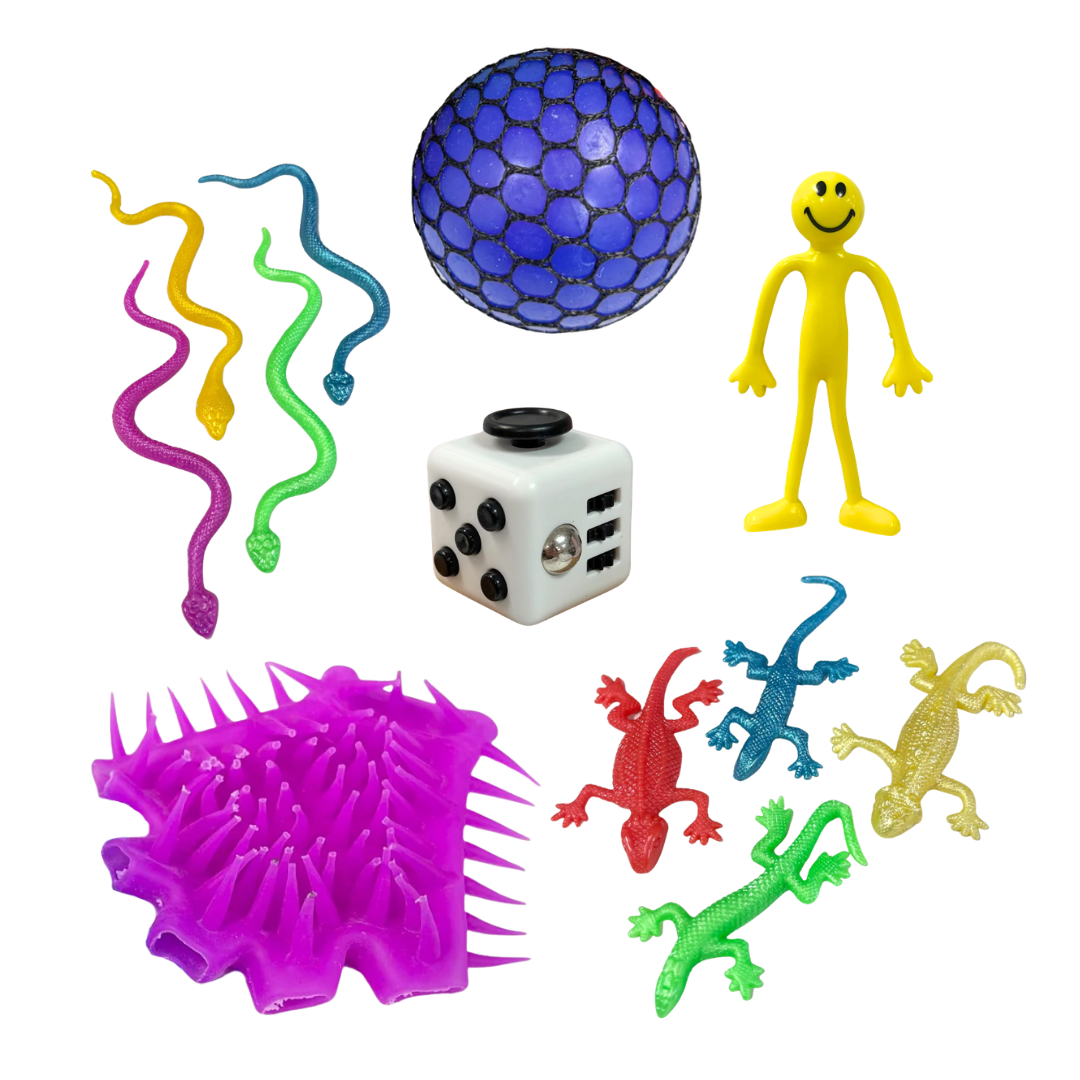 Assorted fidget toys including a blue ball, yellow figure, dice, and colorful snakes on a white background.