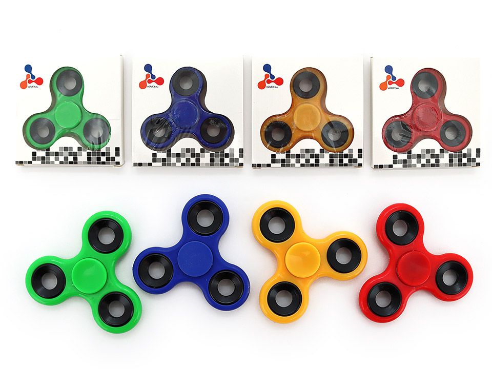 Set of colorful fidget spinners on a white background