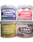 Four containers of 'Lush Mush' butter putty with colorful labels on a white background.